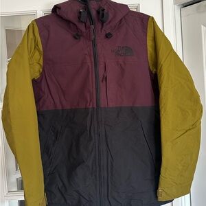 The North Face Purple and Black Ski Jacket for Winter Sports